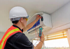 Technician - Engineer investigate Repairing Air Conditioner
